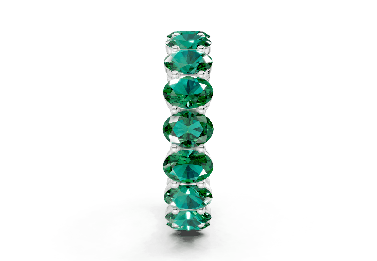 Melrose Oval Cut Emerald Gemstone Eternity Band 6½ Carat Total Wt.