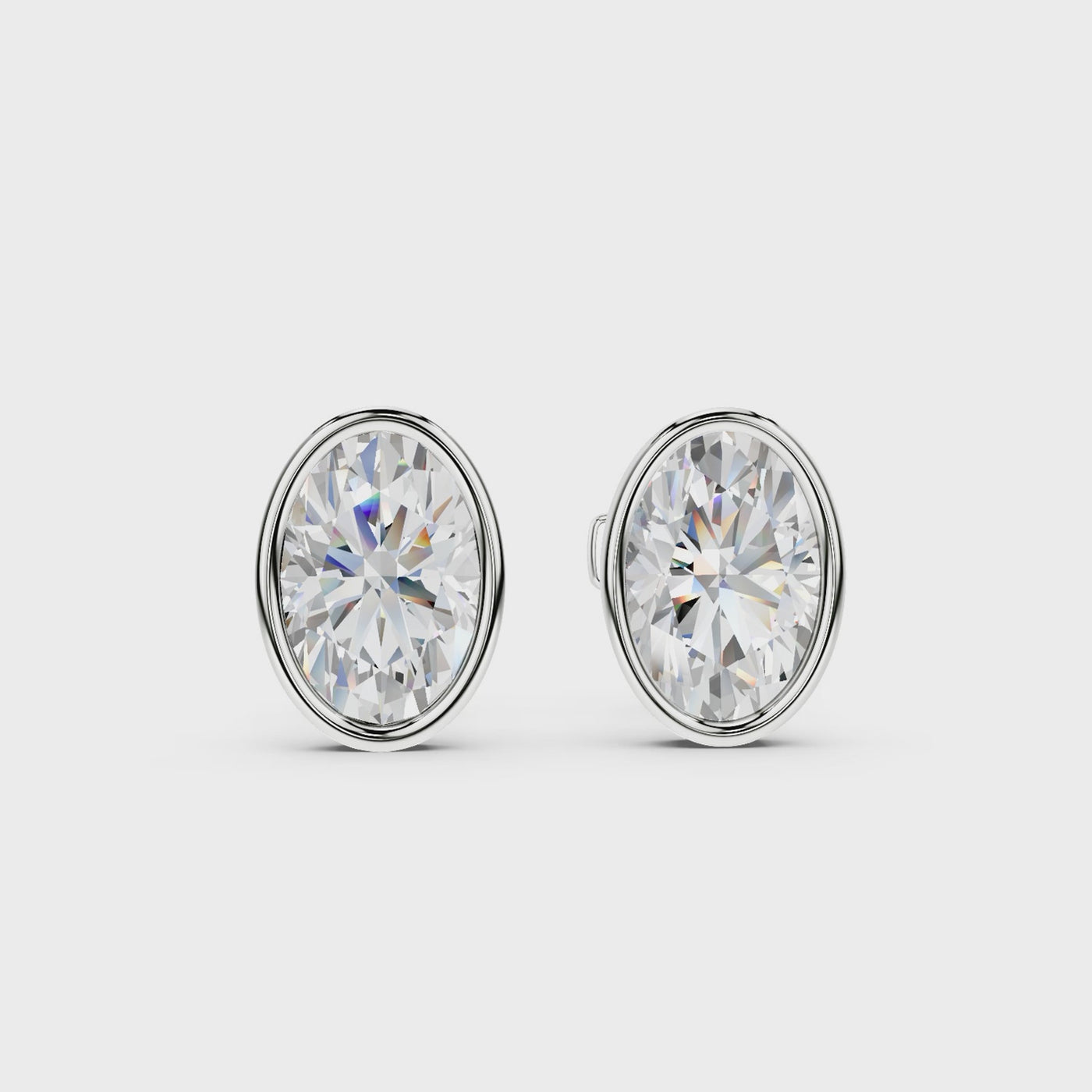 Bezel Set Martini Oval Studs - White Gold - 360 view