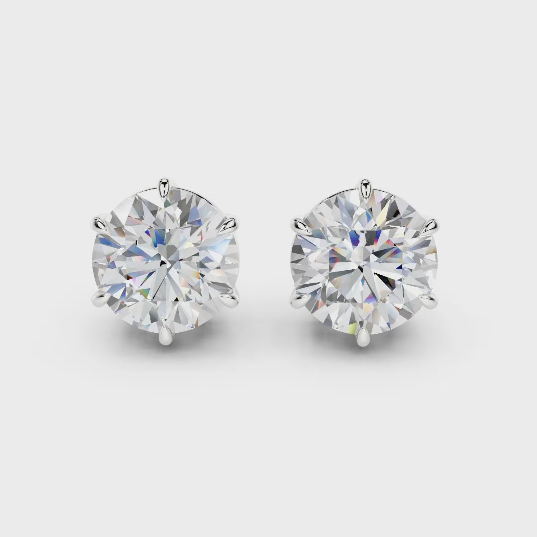 Vienna 6-prong crown round lab-grown diamond stud earrings in 14K White Gold, 360-degree view