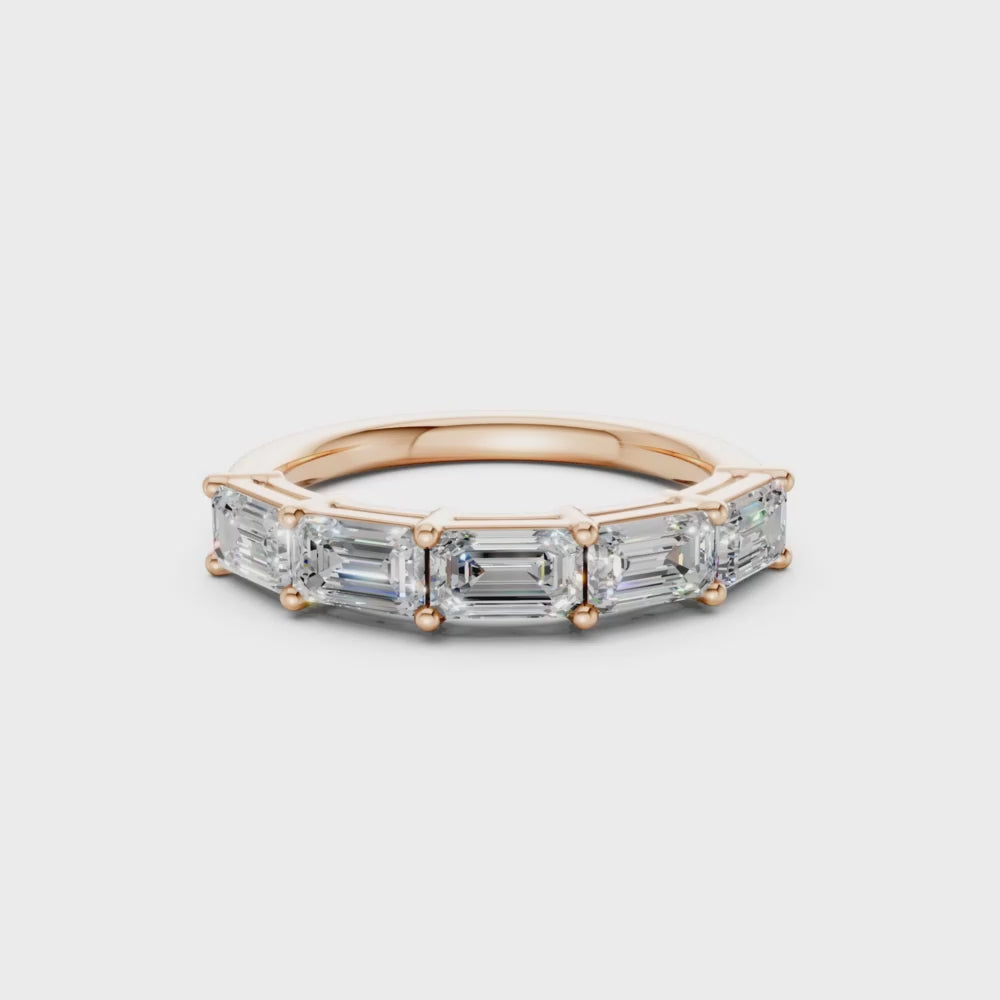 1.50ct emerald cut lab diamond band on hand
