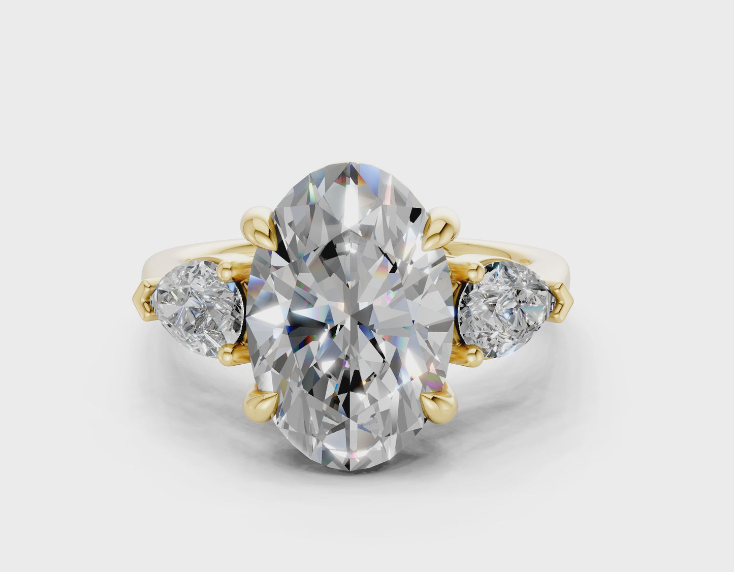 The Vara Three-Stone — 4.00ct Oval E VS1  with Pear Side Stones