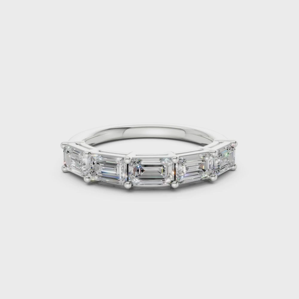 emerald five-stone halfway lab diamond band closeup in white gold