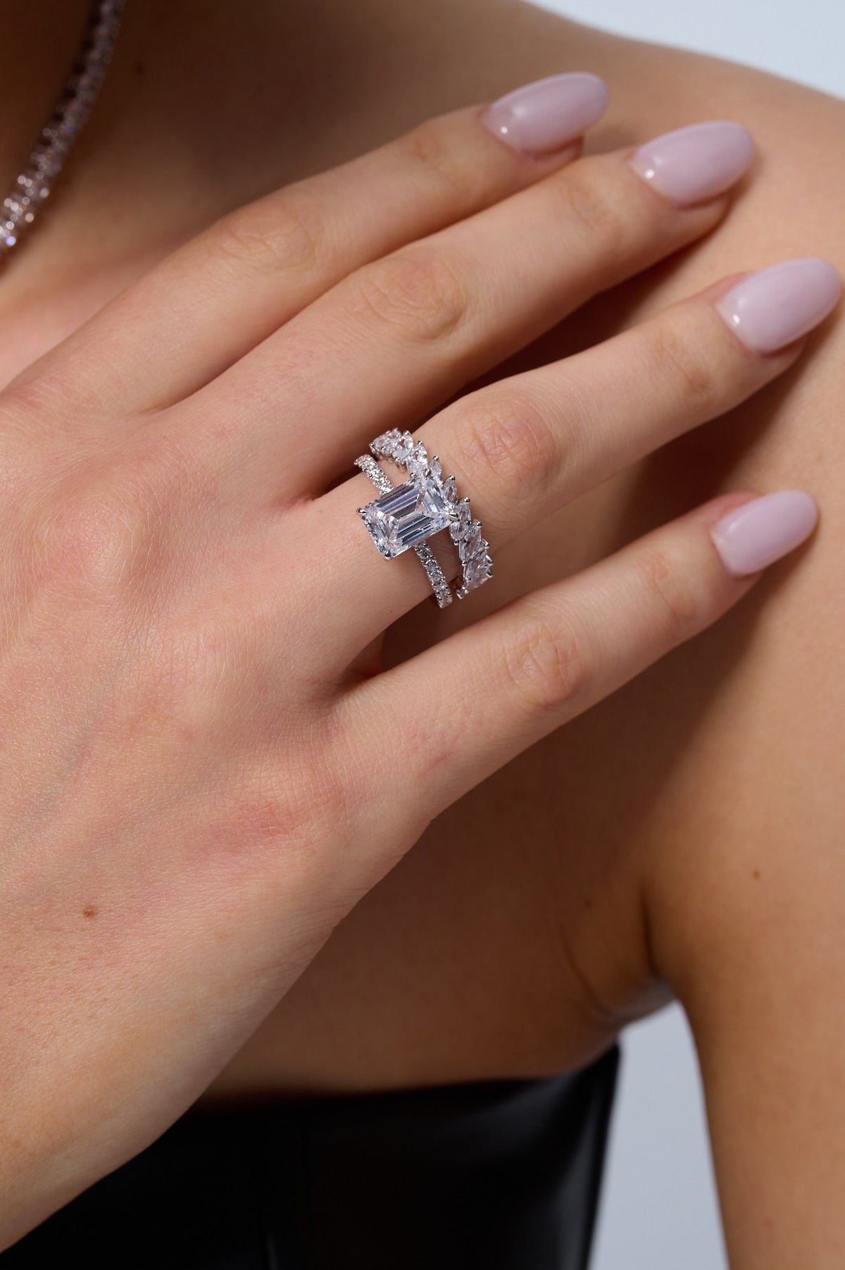 Lab-grown diamond ring, hand to face