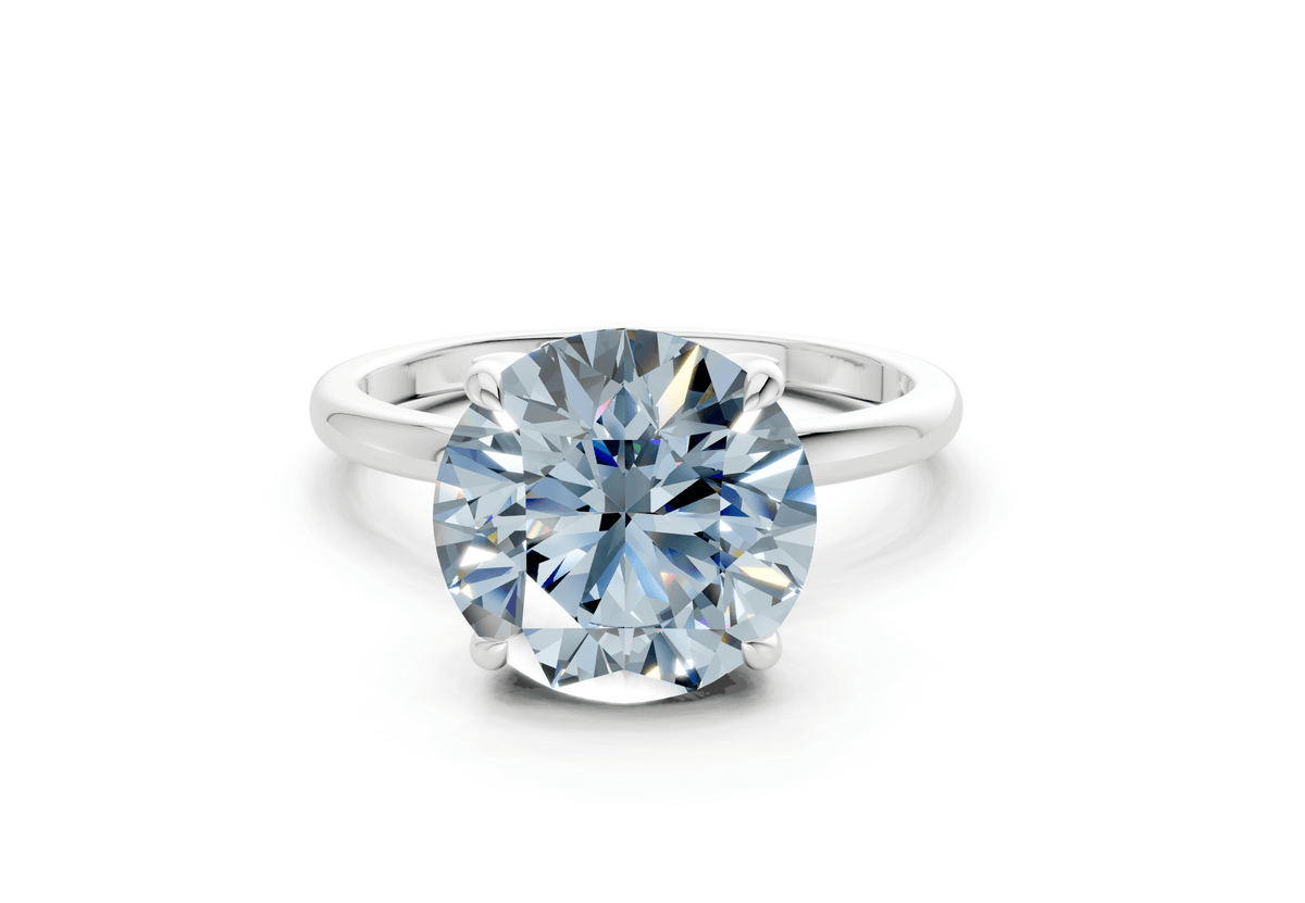 Skye Blue Diamond Solitaire Round Cut 1.8mm Engagement Ring